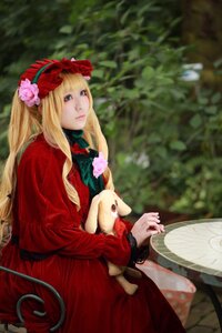 Rating: Safe Score: 0 Tags: 1girl blonde_hair blue_eyes blurry bonnet depth_of_field dress flower hair_ornament lips long_hair long_sleeves red_dress shinku sitting solo stuffed_animal User: admin