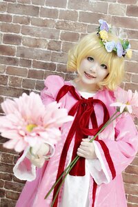 Rating: Safe Score: 0 Tags: 1girl blonde_hair brick_wall dress flower hinaichigo lips looking_at_viewer ribbon short_hair solo User: admin