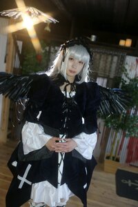 Rating: Safe Score: 0 Tags: 1girl bangs black_dress black_wings blurry blurry_background bookshelf closed_mouth depth_of_field dress feathered_wings feathers frills gothic_lolita hairband lolita_fashion long_hair long_sleeves photo silver_hair solo standing suigintou wings User: admin