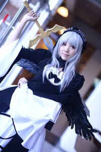 Rating: Safe Score: 0 Tags: 1girl apron blurry blurry_background bow depth_of_field dress frills long_hair long_sleeves looking_at_viewer photo solo standing suigintou wings User: admin