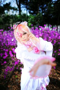 Rating: Safe Score: 0 Tags: 1girl blurry blurry_background blurry_foreground depth_of_field dress eyepatch flower hair_ornament kirakishou lips one_eye_covered outdoors photo pink_flower pink_hair smile solo User: admin