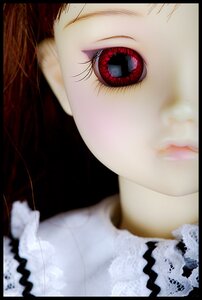 Rating: Safe Score: 0 Tags: 1girl auto_tagged black_background black_border blurry close-up depth_of_field doll letterboxed lips looking_at_viewer red_eyes solo suiseiseki white_hair User: admin
