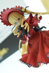 Rating: Safe Score: 0 Tags: 1girl blonde_hair blue_eyes blurry bonnet bow bowtie depth_of_field doll dress drill_hair frills long_hair long_sleeves looking_at_viewer red_dress shinku sidelocks solo standing twin_drills twintails User: admin