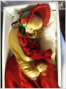 Rating: Safe Score: 0 Tags: 1girl blonde_hair blue_eyes bonnet border doll dress flower long_hair long_sleeves photo red_dress red_rose rose shinku solo User: admin