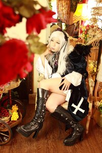 Rating: Safe Score: 0 Tags: 1girl black_footwear blurry blurry_foreground boots cross-laced_footwear depth_of_field dress flower food high_heel_boots high_heels lace-up_boots long_hair sitting solo suigintou white_hair User: admin