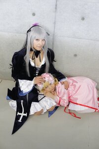 Rating: Safe Score: 0 Tags: 2girls blonde_hair breasts cleavage dress frills lap_pillow long_hair long_sleeves multiple_cosplay multiple_girls ribbon silver_hair sitting suigintou tagme User: admin