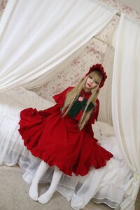 Rating: Safe Score: 0 Tags: 1girl blonde_hair blue_eyes bonnet curtains dress long_hair looking_at_viewer red_dress shinku sitting solo User: admin