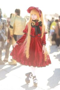 Rating: Safe Score: 0 Tags: 1girl blonde_hair blurry blurry_background blurry_foreground bonnet depth_of_field dress long_hair long_sleeves red_dress shinku solo solo_focus standing User: admin