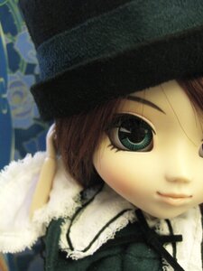 Rating: Safe Score: 0 Tags: 1girl bangs blurry blurry_background close-up closed_mouth depth_of_field doll face fur_trim green_eyes hat lips looking_at_viewer short_hair smile solo souseiseki User: admin