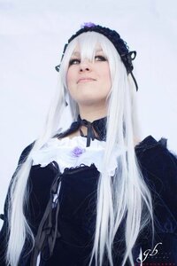 Rating: Safe Score: 0 Tags: 1girl black_dress black_ribbon closed_mouth dress flower frills gothic_lolita hairband lolita_fashion long_hair long_sleeves ribbon silver_hair solo suigintou very_long_hair wings User: admin