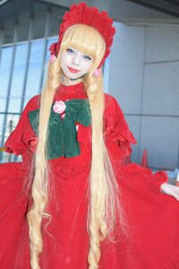 Rating: Safe Score: 0 Tags: 1girl blonde_hair blue_eyes blurry blurry_background bonnet depth_of_field dress drill_hair flower long_hair looking_at_viewer photo red_dress rose shinku sitting solo very_long_hair User: admin