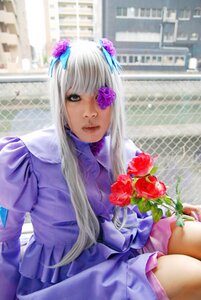 Rating: Safe Score: 0 Tags: 1girl bangs barasuishou blurry building chain-link_fence depth_of_field dress eyepatch fence flower hair_ornament lips long_hair long_sleeves looking_at_viewer photo purple_flower rose sitting solo User: admin