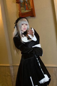 Rating: Safe Score: 0 Tags: 1girl black_dress dress frills gothic_lolita hairband lips lolita_fashion long_hair long_sleeves looking_at_viewer photo realistic red_eyes solo standing suigintou User: admin