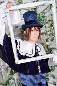 Rating: Safe Score: 0 Tags: brown_hair dress frills green_eyes hat heterochromia leaf looking_at_viewer outdoors plant solo souseiseki top_hat vines User: admin