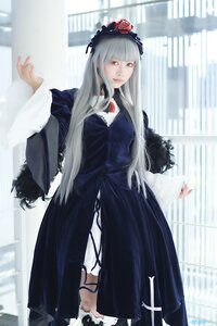 Rating: Safe Score: 0 Tags: 1girl bangs blurry building depth_of_field dress flower gothic_lolita hairband lolita_fashion long_hair long_sleeves looking_at_viewer silver_hair solo standing suigintou User: admin