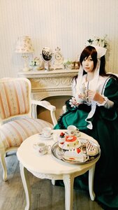 Rating: Safe Score: 0 Tags: 1girl black_hair cake chair cup dress flower food fork long_hair plate saucer sitting solo spoon suiseiseki table teacup User: admin