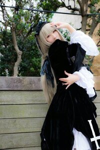 Rating: Safe Score: 0 Tags: 1girl bangs black_dress blonde_hair dress hairband half-closed_eyes long_hair long_sleeves looking_at_viewer outdoors red_eyes solo standing suigintou tree User: admin