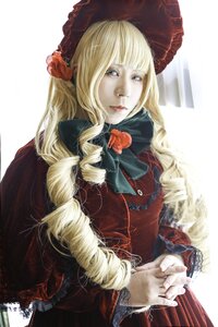 Rating: Safe Score: 0 Tags: 1girl bangs blonde_hair blue_eyes bonnet dress drill_hair flower hat lips long_hair long_sleeves own_hands_together realistic rose shinku solo upper_body User: admin