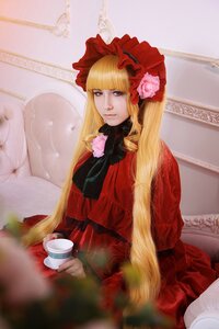 Rating: Safe Score: 0 Tags: 1girl bangs blonde_hair blue_eyes bonnet cup dress flower long_hair red_dress shinku sitting solo teacup User: admin