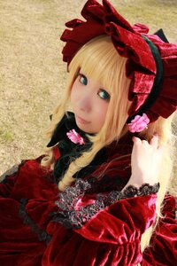 Rating: Safe Score: 0 Tags: 1girl bangs blonde_hair blue_eyes bonnet bow dress flower frills lace lips lolita_fashion long_hair looking_at_viewer red_dress rose shinku solo User: admin