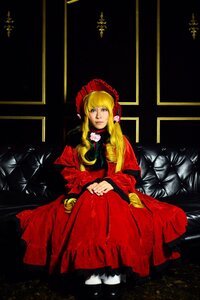 Rating: Safe Score: 0 Tags: 1girl black_background blonde_hair blue_eyes bonnet dress flower long_hair long_sleeves looking_at_viewer red_dress rose shinku solo User: admin