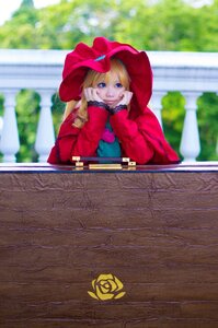 Rating: Safe Score: 0 Tags: 1girl bangs blonde_hair blue_eyes blurry blurry_background depth_of_field dress flower long_sleeves looking_at_viewer red_dress rose shinku sitting solo User: admin