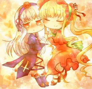 Rating: Safe Score: 0 Tags: 2girls blonde_hair blush bow closed_eyes dress flower hairband heart holding_hands image long_hair multiple_girls pair rose shinku smile suigintou wings yuri User: admin