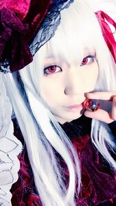 Rating: Safe Score: 0 Tags: 1girl apple bangs closed_mouth food fruit holding holding_fruit long_hair looking_at_viewer nail_polish red_eyes red_nails solo suigintou white_hair User: admin