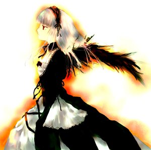 Rating: Safe Score: 0 Tags: 1girl black_dress black_ribbon black_wings dress feathered_wings frilled_sleeves frills hairband image long_hair long_sleeves looking_afar red_eyes silver_hair solo standing suigintou wings User: admin