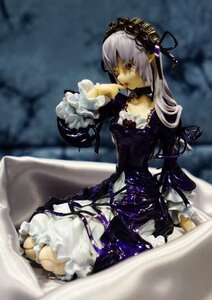 Rating: Safe Score: 0 Tags: 1girl choker doll dress flower frills hairband lolita_fashion lolita_hairband long_hair long_sleeves silver_hair sitting solo suigintou User: admin