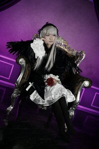 Rating: Safe Score: 0 Tags: 1girl boots chair flower gothic_lolita long_hair looking_at_viewer rose sitting solo suigintou User: admin