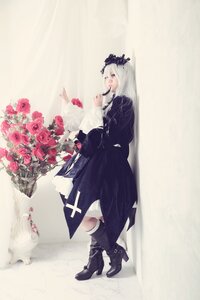 Rating: Safe Score: 0 Tags: 1girl black_footwear boots bouquet dress flower full_body high_heel_boots high_heels long_hair profile red_flower red_rose rose solo suigintou white_hair User: admin