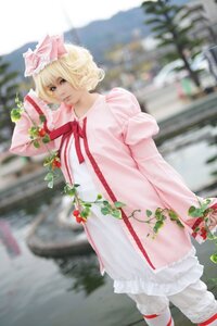 Rating: Safe Score: 0 Tags: 1girl blonde_hair bloomers blue_eyes blurry blurry_background blurry_foreground day depth_of_field dress flower frills hat hinaichigo long_sleeves looking_at_viewer outdoors photo ribbon short_hair solo standing striped underwear User: admin