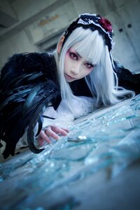 Rating: Safe Score: 0 Tags: 1girl bangs blurry blurry_background closed_mouth depth_of_field flower frills fur_trim gothic_lolita hairband lips lolita_fashion long_hair looking_at_viewer red_eyes silver_hair solo suigintou water User: admin
