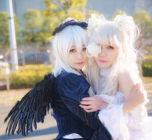 Rating: Safe Score: 0 Tags: 2girls blurry blurry_background closed_mouth depth_of_field dress lips long_hair looking_at_viewer multiple_cosplay multiple_girls outdoors photo red_lips siblings sisters tagme upper_body white_hair wings User: admin