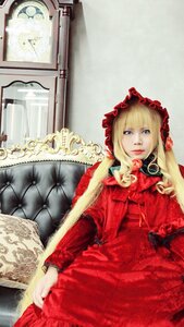 Rating: Safe Score: 0 Tags: 1girl blonde_hair blue_eyes bonnet dress flower long_hair long_sleeves looking_at_viewer red_dress rose shinku sitting solo twintails User: admin