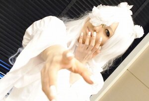 Rating: Safe Score: 0 Tags: 1girl 3d blurry blurry_foreground depth_of_field foreshortening hands kirakishou lips long_sleeves nail_polish outstretched_arm photo solo vertical_stripes white_hair User: admin