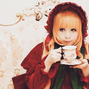 Rating: Safe Score: 0 Tags: 1girl bangs blonde_hair blue_eyes bonnet cup dress frills holding holding_cup long_hair long_sleeves looking_at_viewer saucer shinku solo tea teacup upper_body User: admin