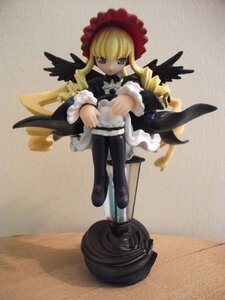 Rating: Safe Score: 0 Tags: 1girl bangs black_wings blonde_hair blue_eyes boots doll dress frills full_body long_hair long_sleeves photo shinku sitting solo wings User: admin