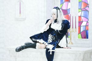 Rating: Safe Score: 0 Tags: 1girl black_footwear black_legwear boots dress frills long_hair long_sleeves sitting solo suigintou User: admin