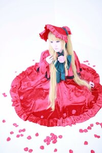 Rating: Safe Score: 0 Tags: 1girl blonde_hair blue_eyes bonnet bow dress flower long_hair long_sleeves looking_at_viewer petals pink_flower pink_rose red_dress rose shinku sitting solo striped very_long_hair User: admin