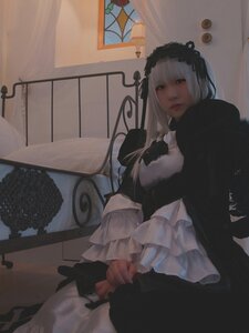 Rating: Safe Score: 0 Tags: 1girl bangs frills gothic_lolita indoors lips lolita_fashion long_hair long_sleeves looking_at_viewer sitting solo suigintou User: admin