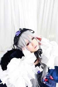 Rating: Safe Score: 0 Tags: 1girl dress flower hair_ribbon lips lolita_fashion long_hair looking_at_viewer red_eyes ribbon silver_hair solo suigintou User: admin