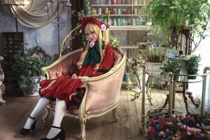 Rating: Safe Score: 0 Tags: 1girl blonde_hair bonnet doll_joints dress flower long_hair red_dress rose shinku shoes sitting solo white_legwear User: admin