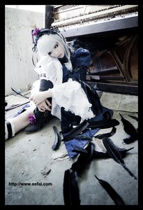 Rating: Safe Score: 0 Tags: 1girl auto_tagged dress feathers flower frills letterboxed lolita_fashion silver_hair sitting solo suigintou wings User: admin