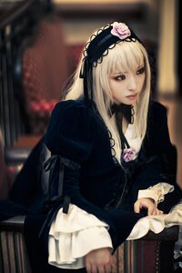 Rating: Safe Score: 0 Tags: 1girl blonde_hair blurry blurry_background depth_of_field dress flower frills gothic_lolita hairband lolita_fashion long_hair long_sleeves looking_at_viewer rose sitting solo suigintou User: admin