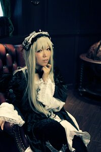 Rating: Safe Score: 0 Tags: 1girl black_dress blonde_hair dress frills gothic_lolita hairband lips lolita_fashion long_hair long_sleeves looking_at_viewer sitting solo suigintou User: admin