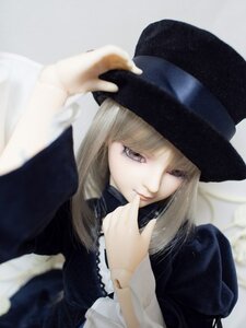 Rating: Safe Score: 0 Tags: 1girl apron blonde_hair blurry closed_mouth depth_of_field doll dress finger_to_mouth hat lips long_hair long_sleeves looking_at_viewer solo suigintou upper_body User: admin