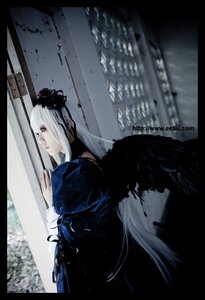 Rating: Safe Score: 0 Tags: 1girl black_dress dress feathers flower gothic_lolita letterboxed lips long_hair long_sleeves profile solo suigintou wings User: admin