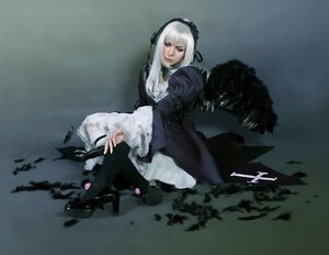 Rating: Safe Score: 0 Tags: 1girl black_dress dress feathers frills full_body hairband long_sleeves silver_hair solo suigintou wide_sleeves wings User: admin